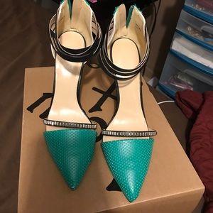 Green and black studded heels