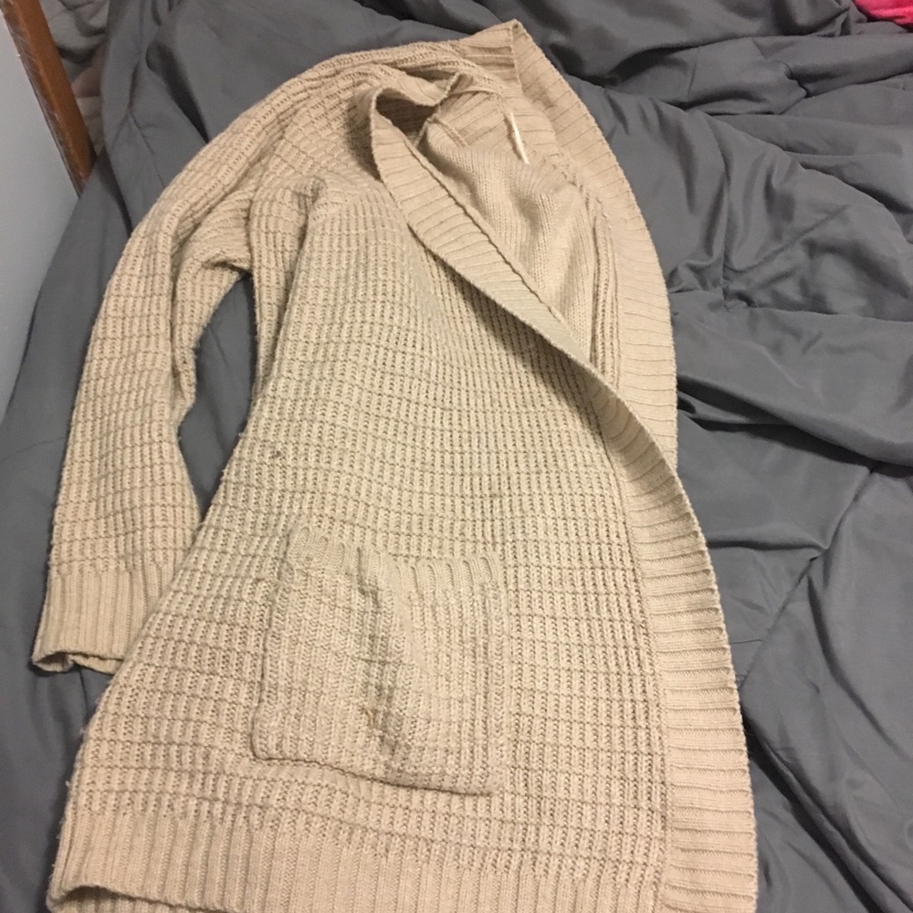 A tan knitted Cardigan