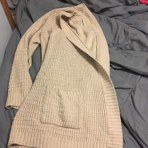 A tan knitted Cardigan