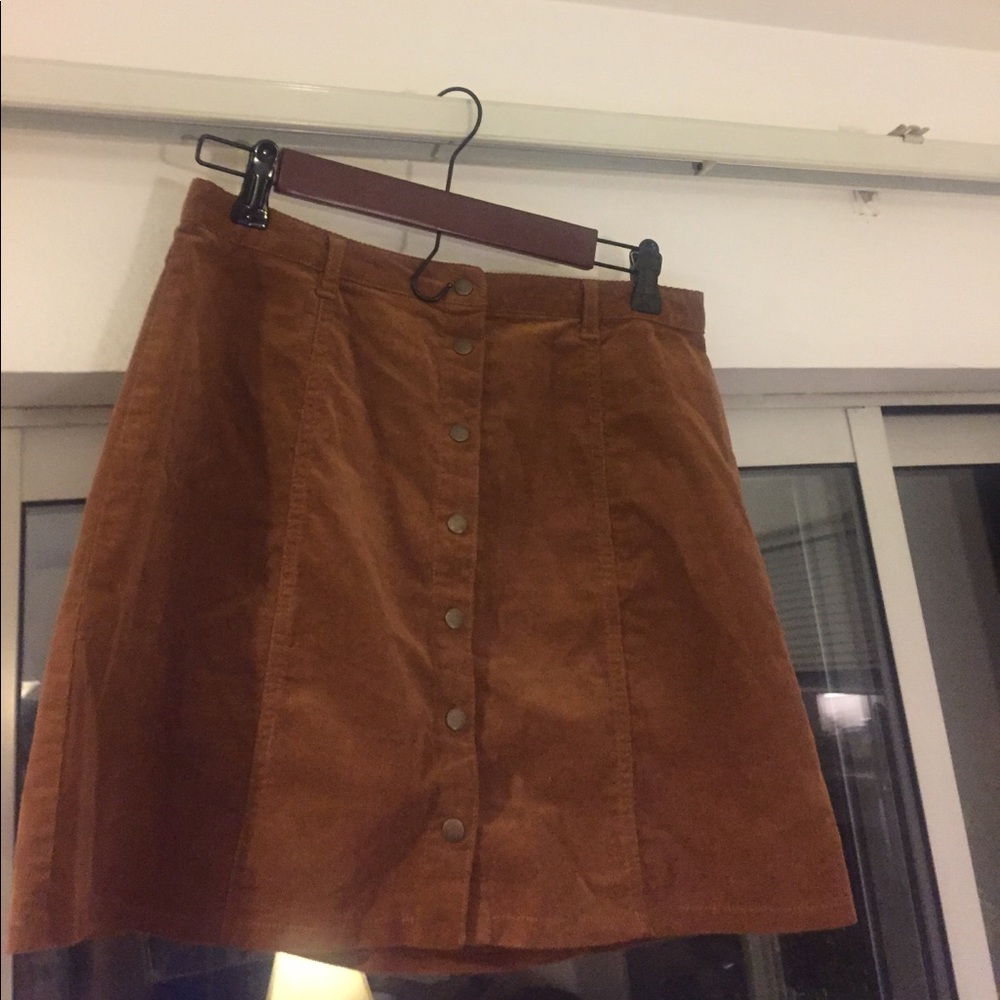 Corduroy tan mini skirt with brass details