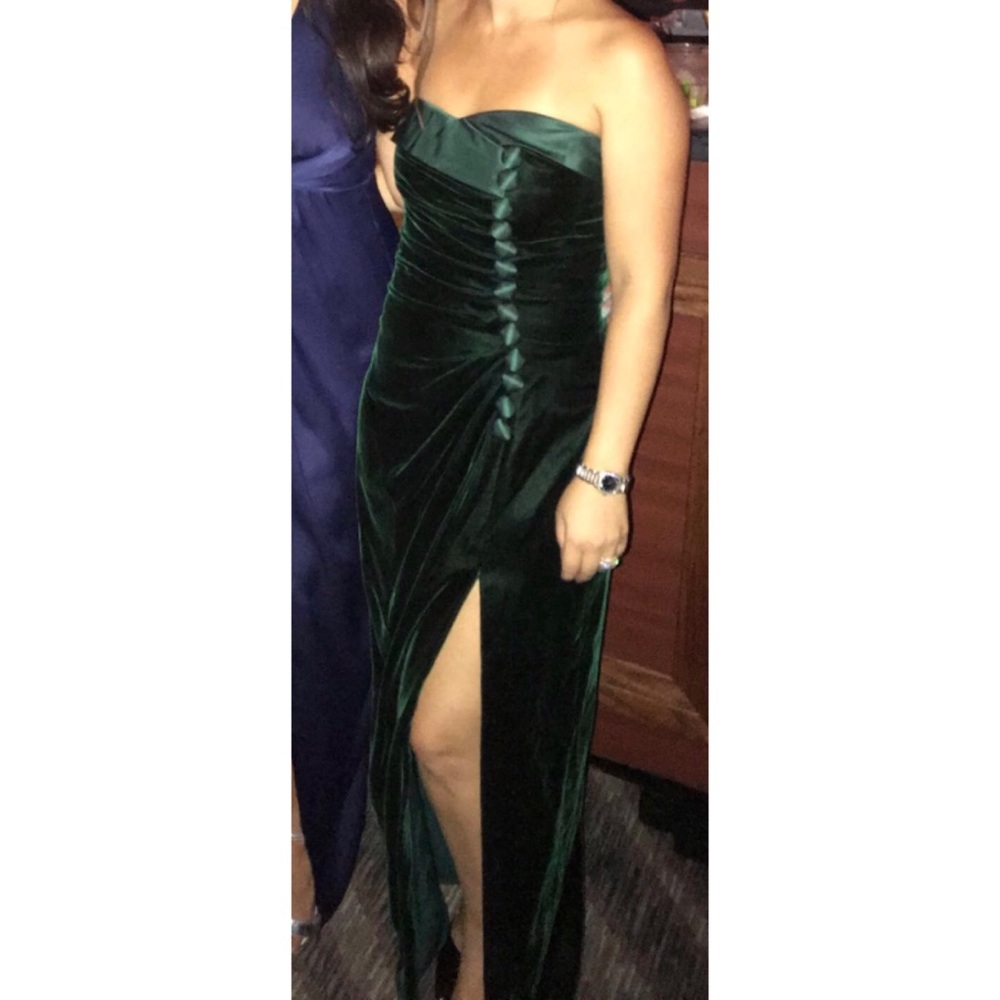 Emerald green velvet evening gown