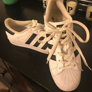 White and black Adidas Superstars (hardly worn)