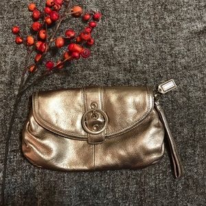 Gold metallic coach wristlet