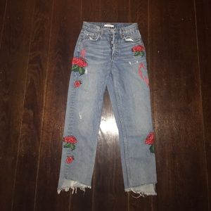 Blue jeans with floral embroidery