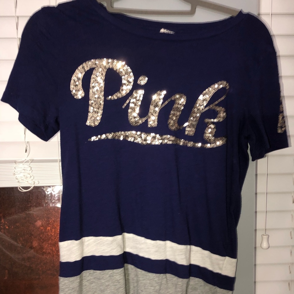 Blue Victoria’s Secret Pink t-shirt.