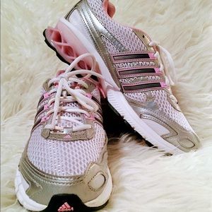 Women’s pink and white Adidas
