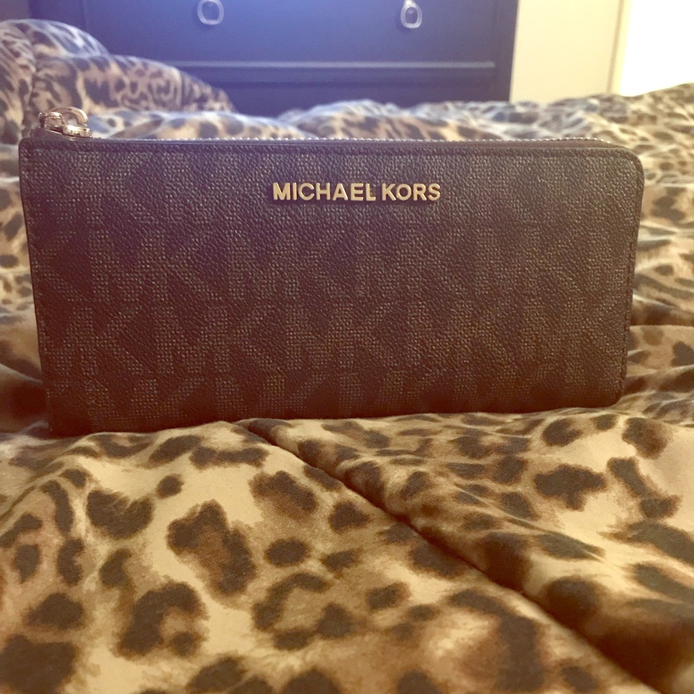Michael Kors zip wallet.