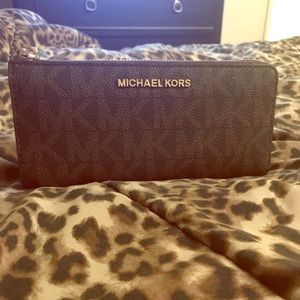 Michael Kors zip wallet.