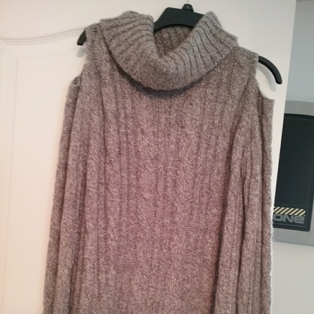 Cold shoulder turtle neck sweater