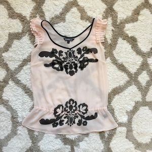 Stunning Express peplum sheer tank
