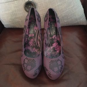 Black sequin skull and purple heels