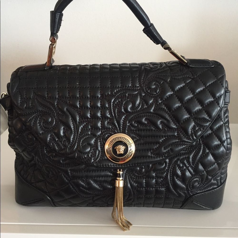 Versace original handbag -BRAND NEW. With strap.