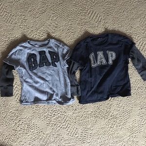 Two long sleeve shirts.