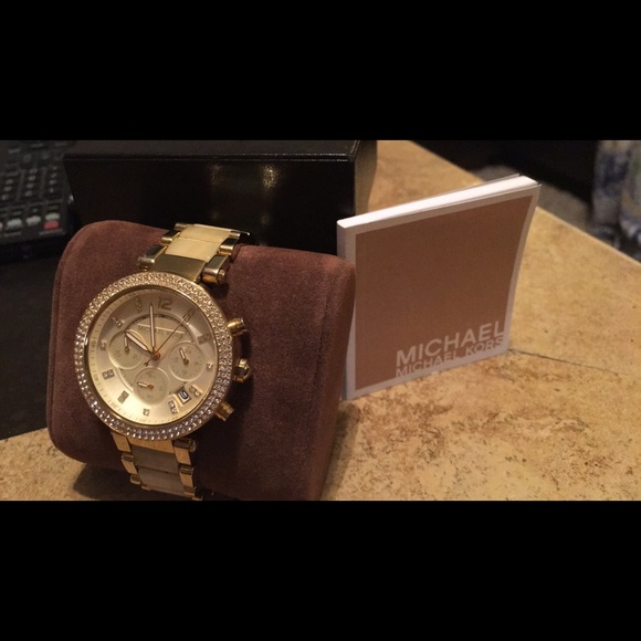 Authentic Mk gold and creme stoned watch
