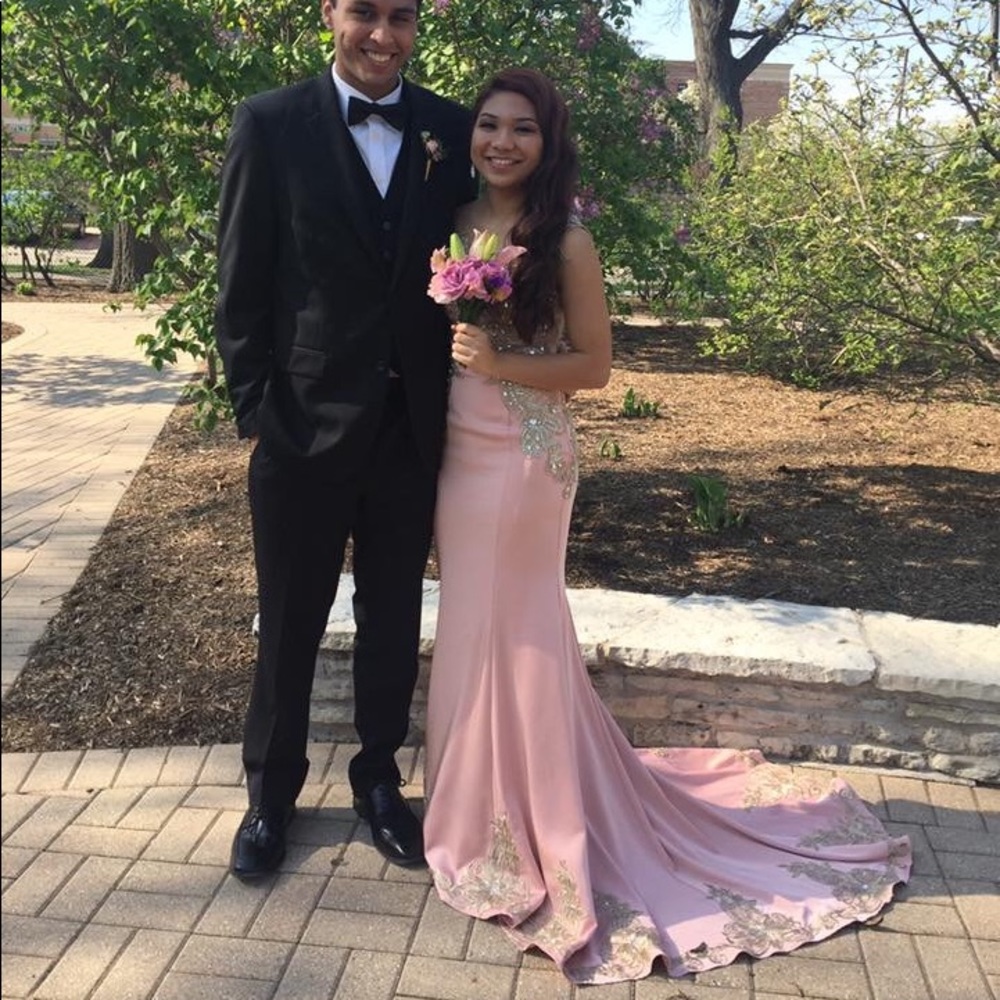 pink prom dress with a long trail