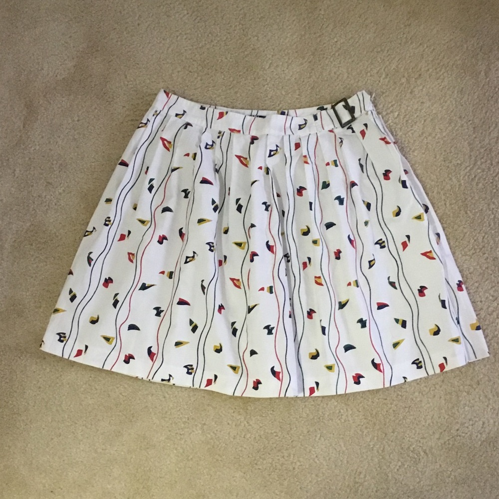 Nautical- inspired white pleated mini.