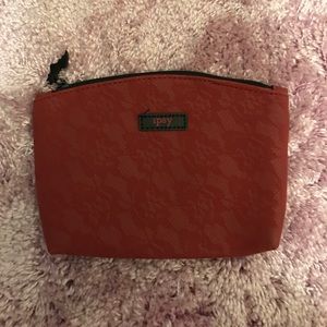 NWOT Ipsy Makeup bag in a lace print