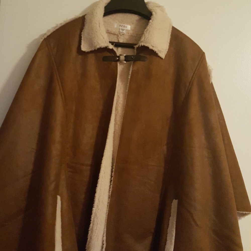 Soft polyester poncho brand new w/o tags. Worn 1 time