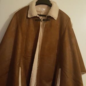 Soft polyester poncho brand new w/o tags. Worn 1 time