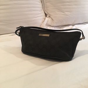Black on black Gucci pouchette