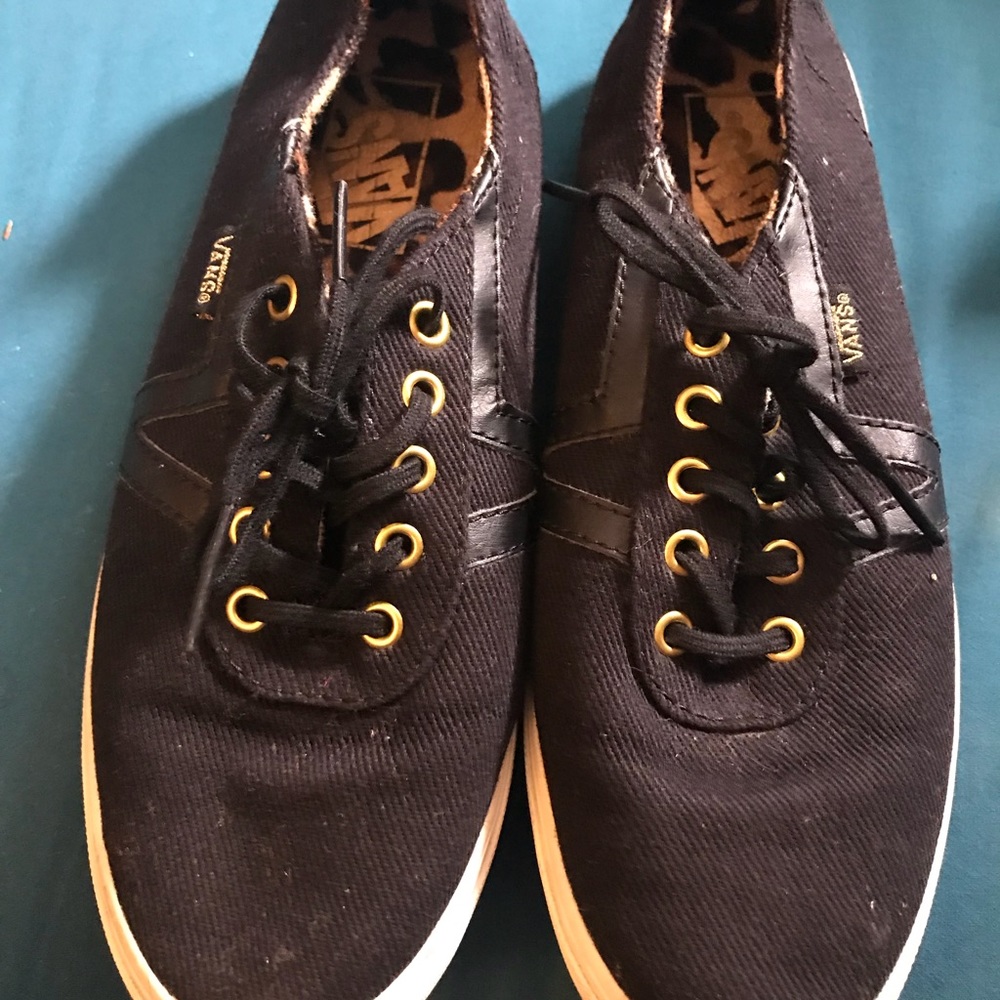 Black and gold vans