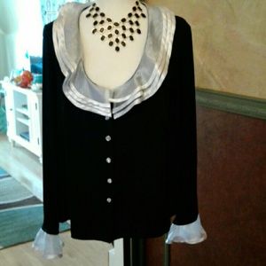 Beautiful black and white holiday blouse.