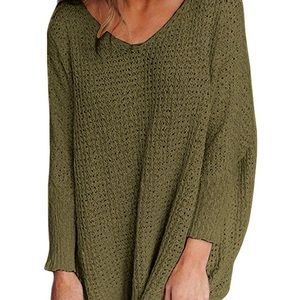 Oversized green cable-knit sweater