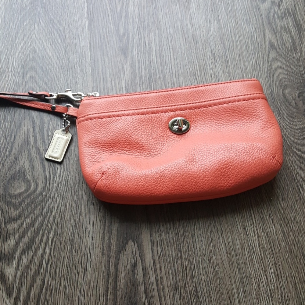 Coral coach wristlet