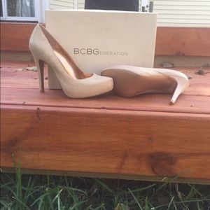 Nude platform heels.