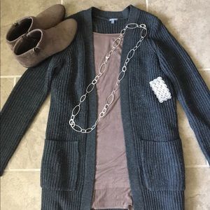 Brown Piko like Top with Grey Cardigan.