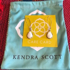 Kendra Scott gold metal with white stone