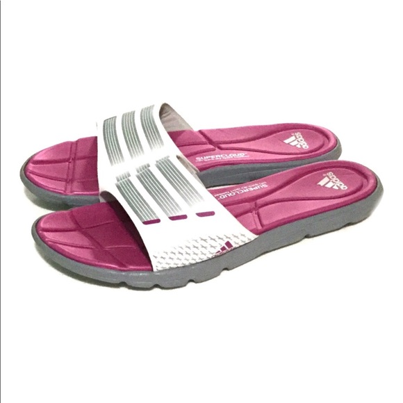 pink and white adidas slides