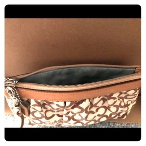 Coach brown and white monogrammed wristlet