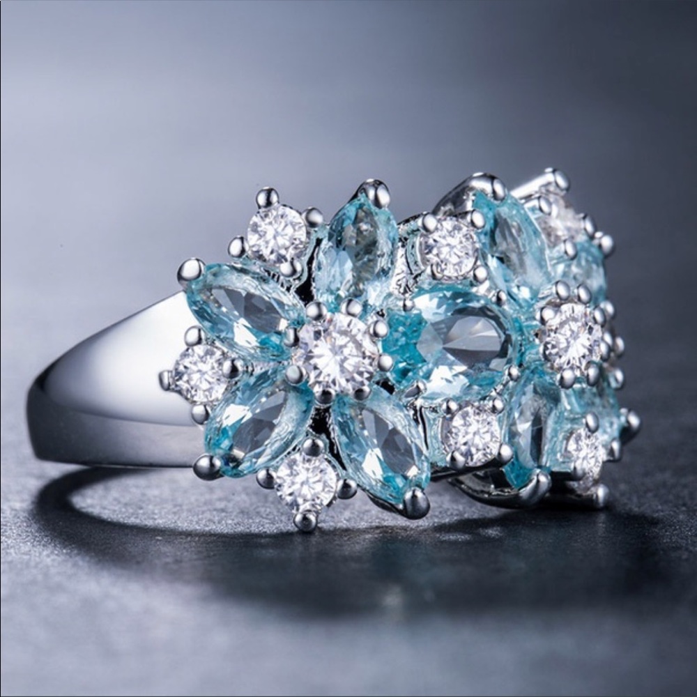 Sterling silver aquamarine and white topaz ring