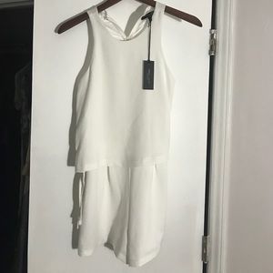 White jumper with lace on the side