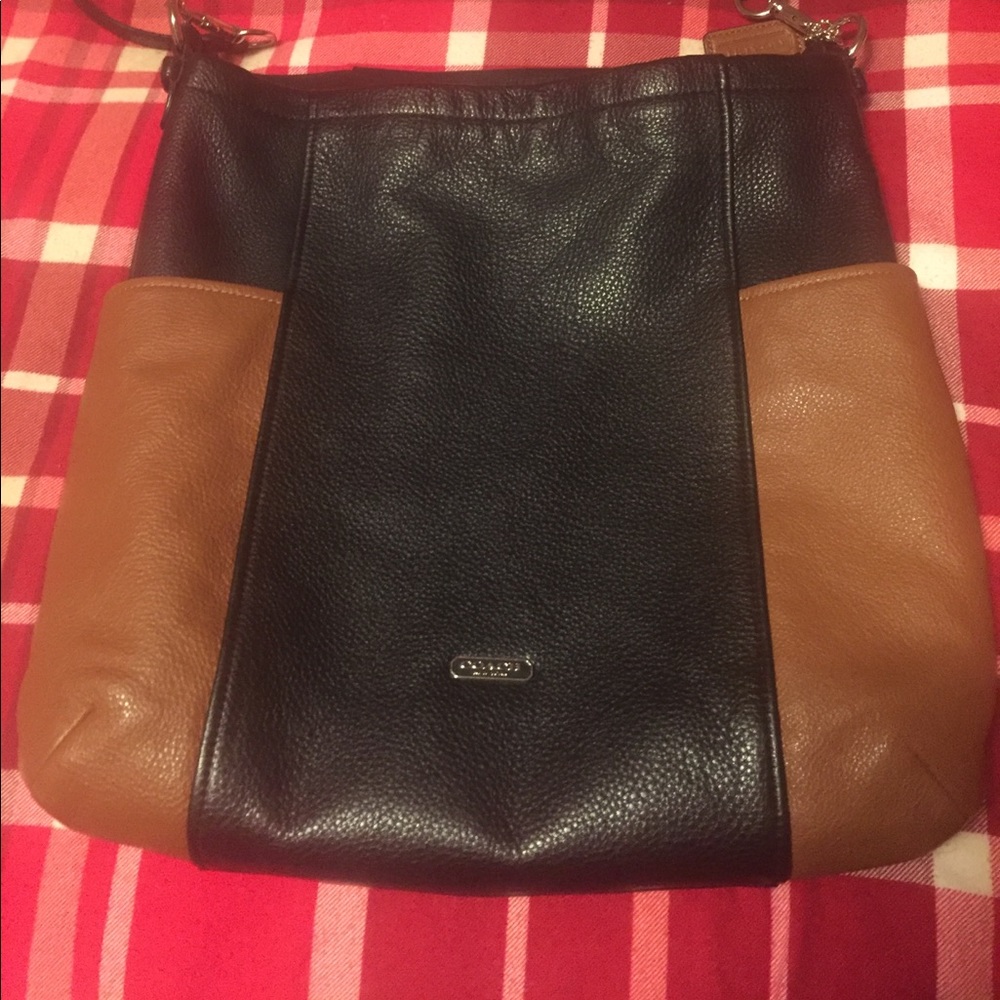 Coach crossbody two tone purse with silver details
