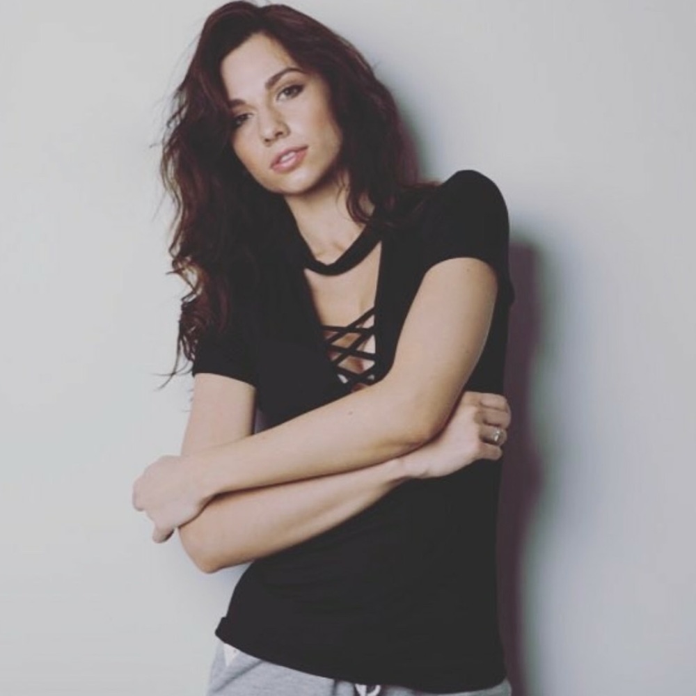 Kinetix black top with choker neckline