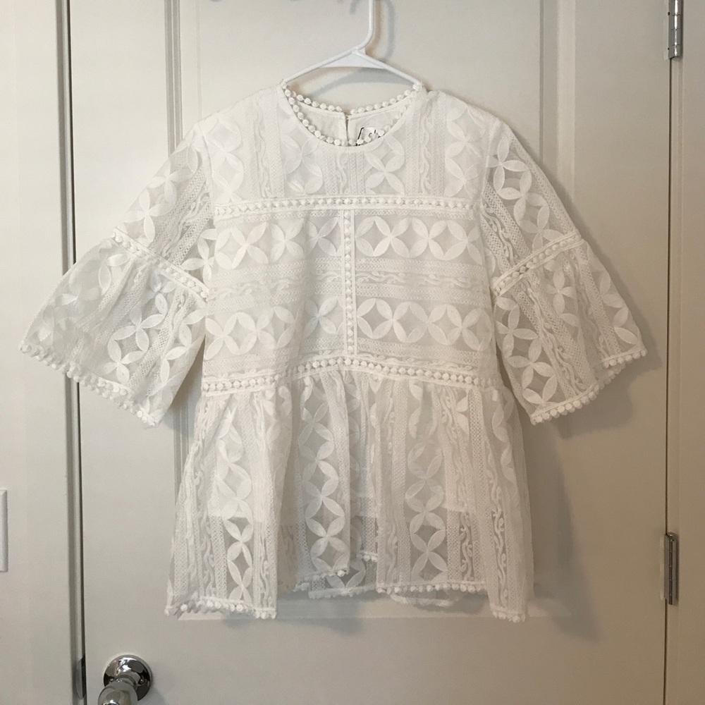 Brand new white lace peplum top with bell sleeves
