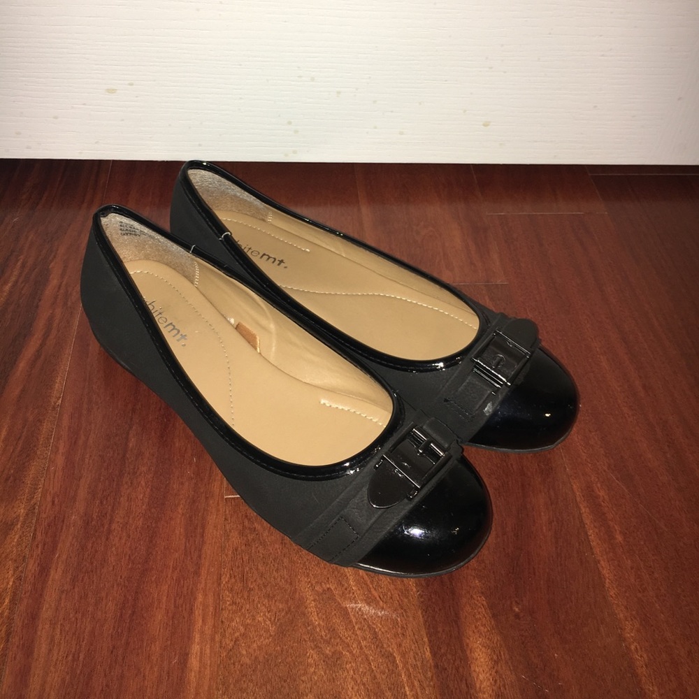 Black Flats with a Decorative Buckle