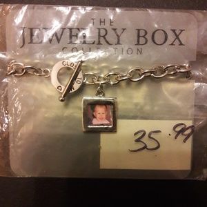 Silver charm braclet