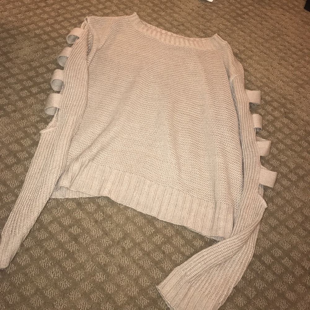 Sweater with cut out sleeves