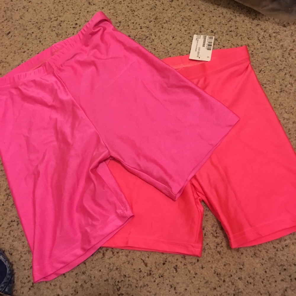 2 pairs of nylon american apparel shorts