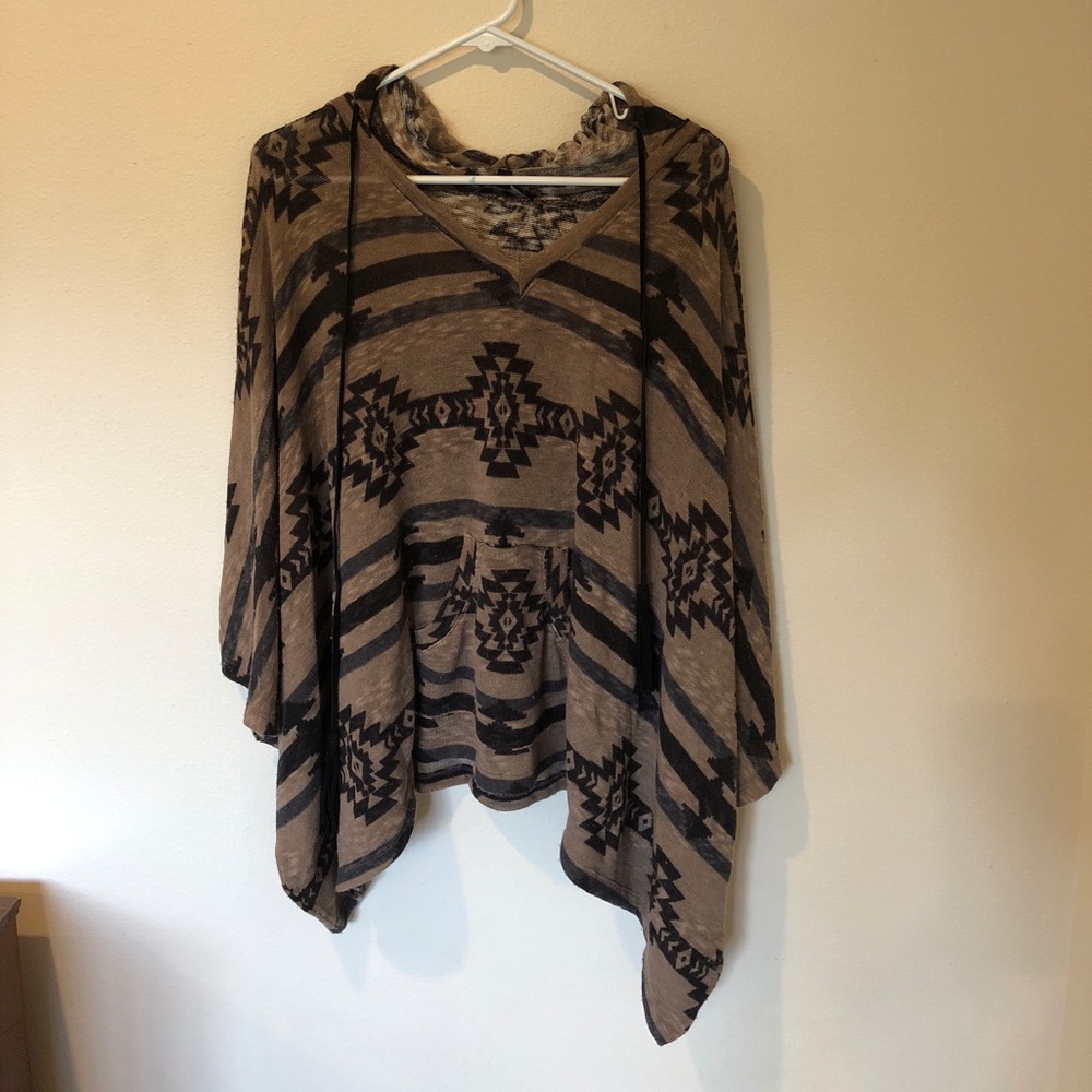 Versatile poncho style top in browns and black!