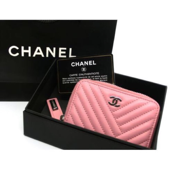 CHANEL Handbags - Chanel pink Lambskin zip around wallet
