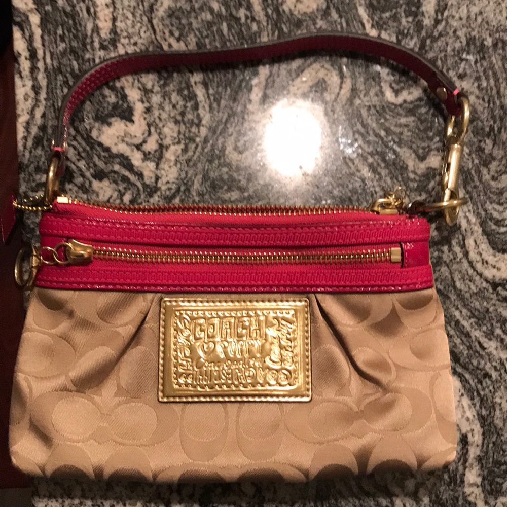 Mini Coach poppy clutch