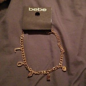 Bebe love gold choker necklace