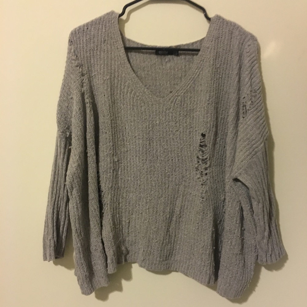 distressed sweater