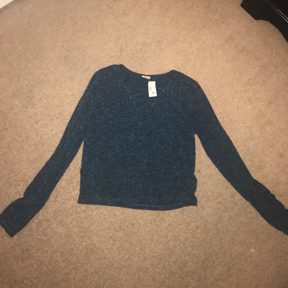 NWT shirt with cross strings in front