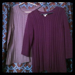 Grey and purple sweaters