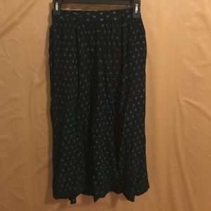A sweet vintage black and blue polka dot skirt